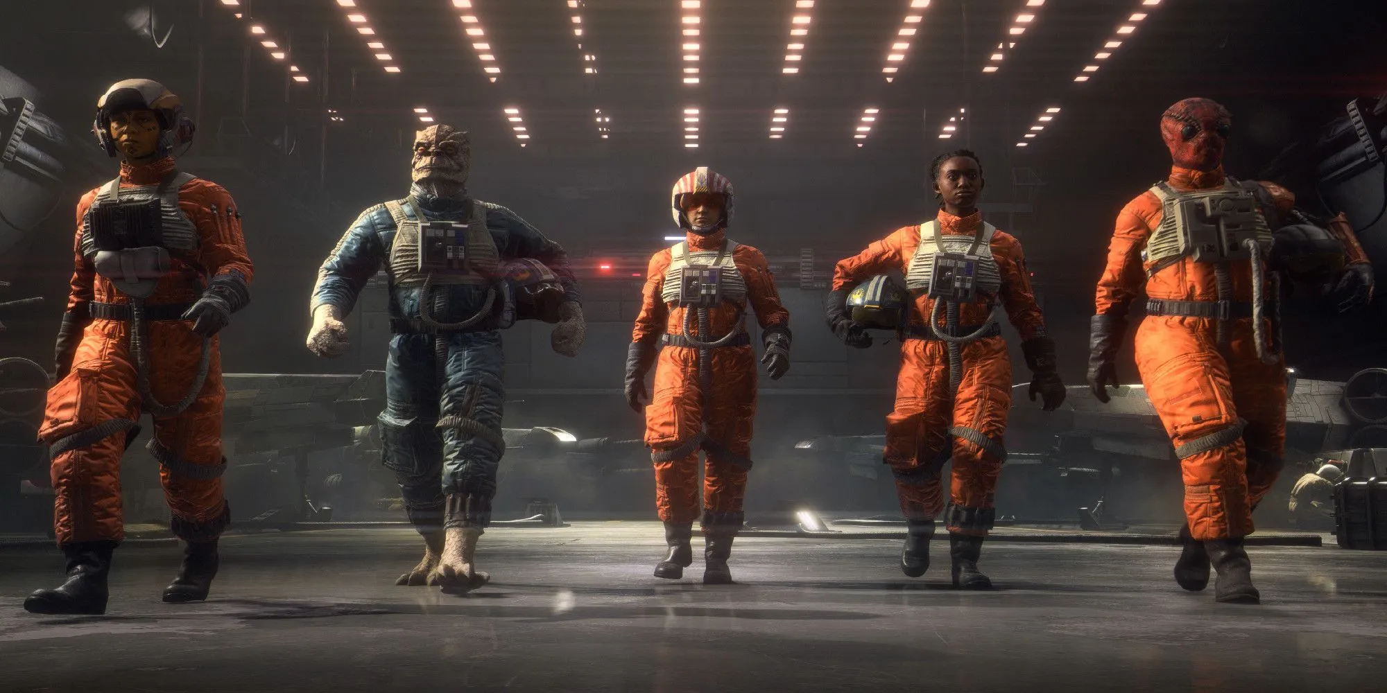 Các phi công Liên minh Nổi dậy đi trong nhà chứa máy bay trong Star Wars: Squadrons.