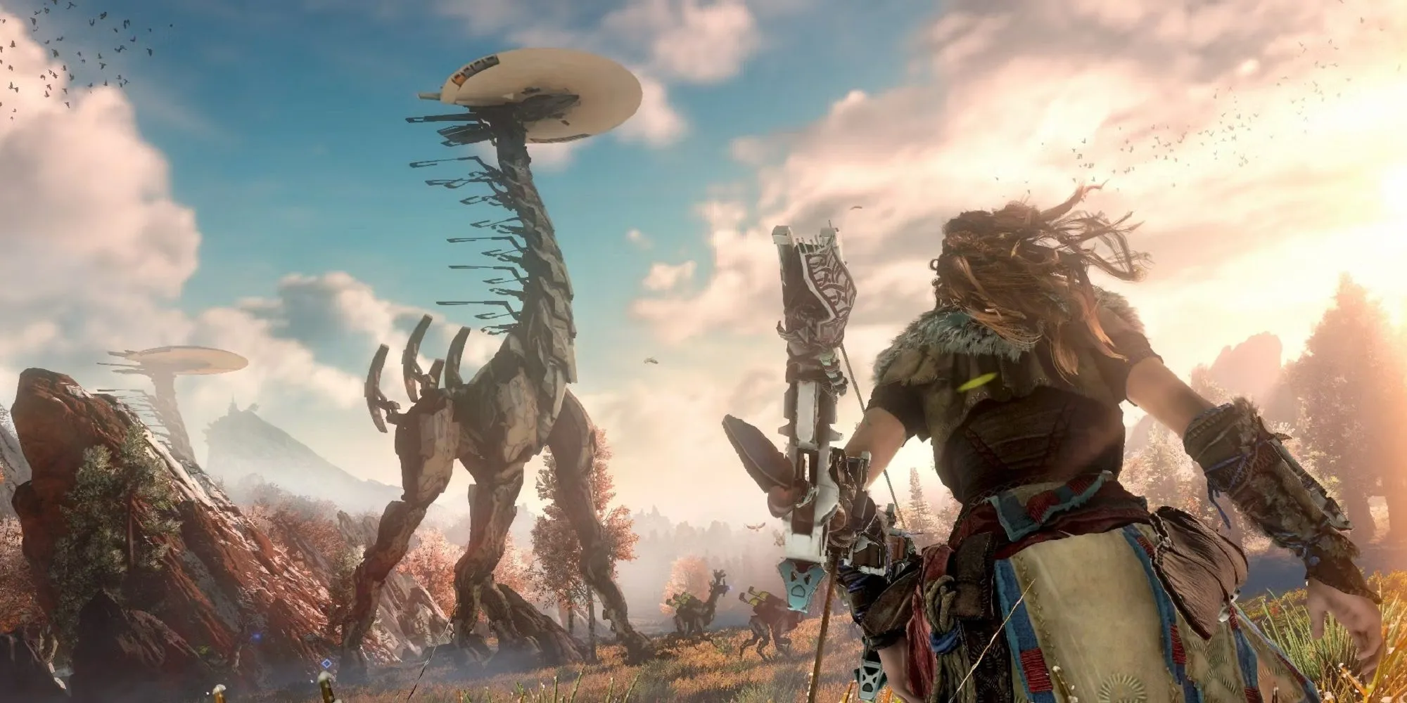 Aloy trong Horizon Zero Dawn, nhìn lên Tallneck khổng lồ, thể hiện thế giới mở rộng lớn.