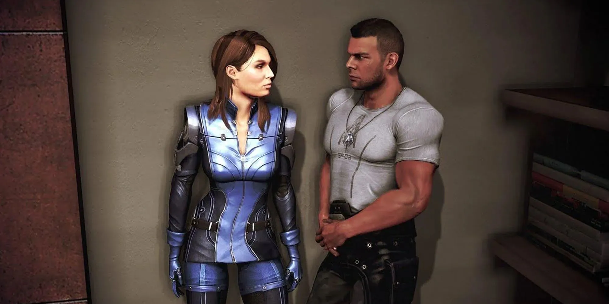 Ashley Williams và James Vega, hai người lính thiện chiến của Mass Effect, đứng cạnh nhau thể hiện sự kiên cường và sẵn sàng chiến đấu với vũ khí quân sự.