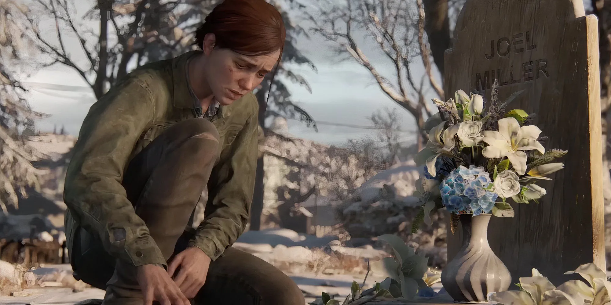Ellie Williams bên giường Joel Miller trong The Last of Us Part 2. Game hành động phiêu lưu này bị chỉ trích vì thời lượng quá dài và thay đổi góc nhìn liên tục.